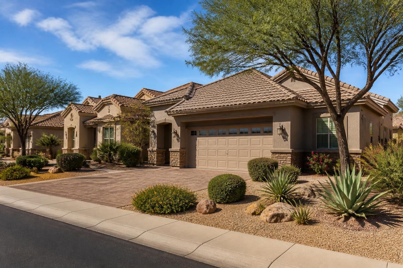 Well-kept suburban neighborhood with finished rooftops in Gilbert.